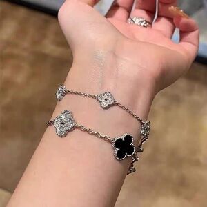 Elegant Silver and Black Clover Bracelet